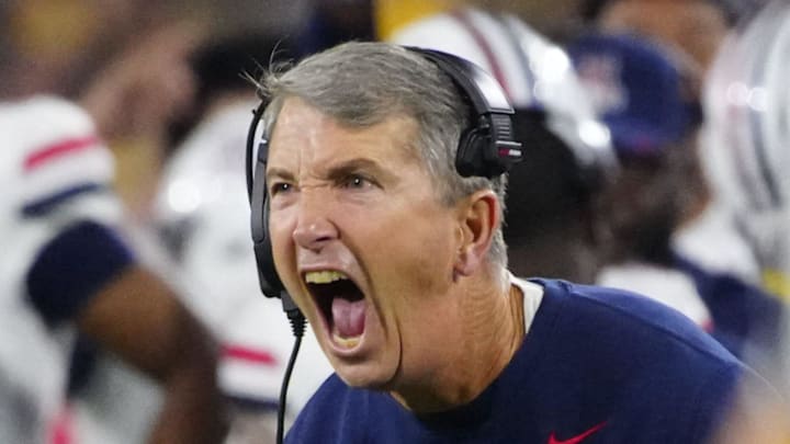 Arizona head coach Brent Brennan celebrates during a game against Arizona State at Mountain America Stadium in Tempe on Nov. 28, 2025.