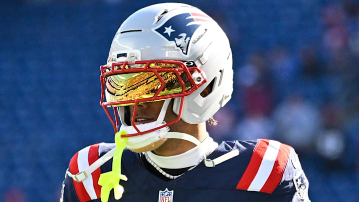 Nov 2, 2025; Foxborough, Massachusetts, USA; New England Patriots cornerback Christian Gonzalez (0) warms up before a game against the Atlanta Falcons at Gillette Stadium. Mandatory Credit: Eric Canha-Imagn Images