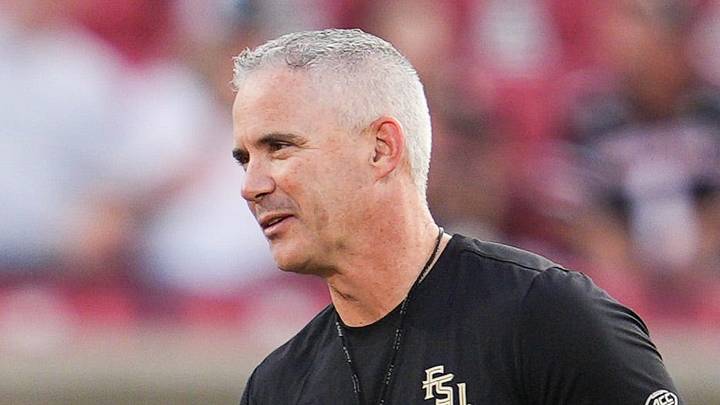 Louisville Cardinals head coach Jeff Brohm greets Florida State Seminoles head coach Mike Norvell before ACC college football at L&N Stadium in Louisville, Kentucky. Oct. 9, 2026. Louisville Cardinals head coach Jeff Brohm greets Florida State Seminoles head coach Mike Norvell before ACC college football at L&N Stadium in Louisville, Kentucky. Oct. 9, 2026.