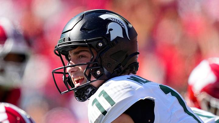 Oct 3, 2026; Madison, Wisconsin, USA; Michigan State Spartans quarterback Alessio Milivojevic (11) calls out prior to a play during the second quarter against the Wisconsin Badgers at Camp Randall Stadium. Mandatory Credit: Jeff Hanisch-Imagn Images Oct 3, 2026; Madison, Wisconsin, USA; Michigan State Spartans quarterback Alessio Milivojevic (11) calls out prior to a play during the second quarter against the Wisconsin Badgers at Camp Randall Stadium. Mandatory Credit: Jeff Hanisch-Imagn Images