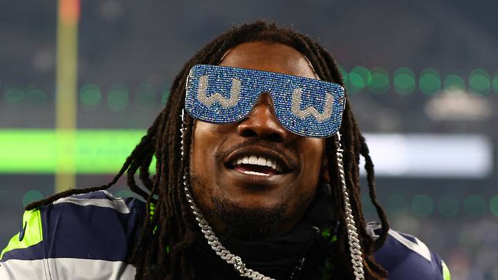 Former Seattle Seahawks cornerback Riq Woolen celebrates