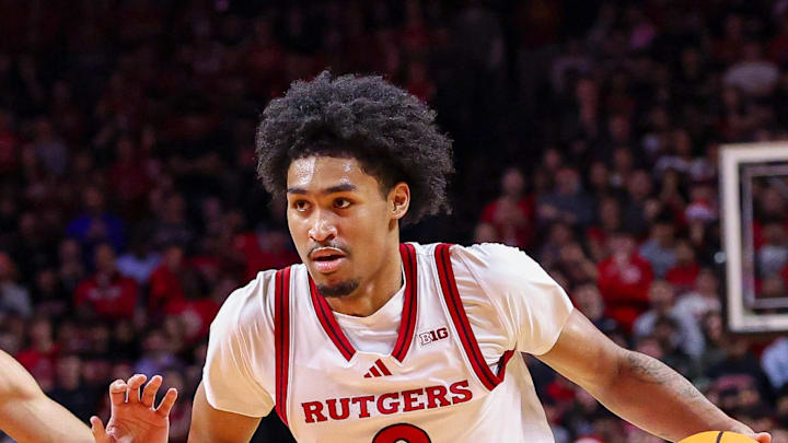 Dec 10, 2024; Piscataway, New Jersey, USA; Rutgers Scarlet Knights guard Dylan Harper (2) drives to the basket against Penn State Nittany Lions guard Freddie Dilione V (4) during the second half at Jersey Mike's Arena. Mandatory Credit: Vincent Carchietta-Imagn Images