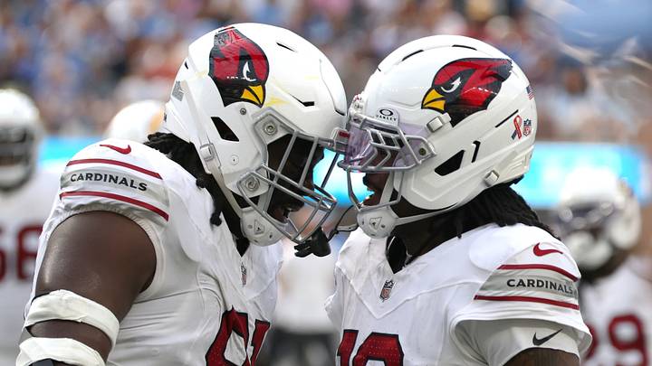 Sep 13, 2026; Inglewood, California, USA; Arizona Cardinals defensive line L.J. Collier (91) reacts with cornerback Max Melton (16) after making a tackle against the Los Angeles Chargers during the fourth quarter at SoFi Stadium. Mandatory Credit: Kiyoshi Mio-Imagn Images Sep 13, 2026; Inglewood, California, USA; Arizona Cardinals defensive line L.J. Collier (91) reacts with cornerback Max Melton (16) after making a tackle against the Los Angeles Chargers during the fourth quarter at SoFi Stadium. Mandatory Credit: Kiyoshi Mio-Imagn Images