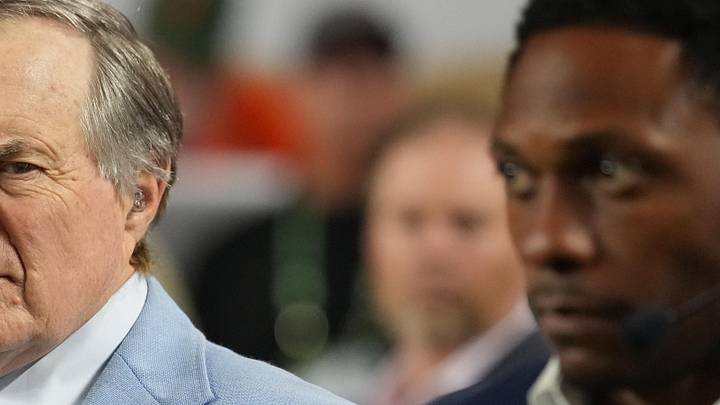 Jan 19, 2026; Miami Gardens, FL, USA; TV analyst Bill Belichick watches the Miami Hurricanes play the Indiana Hoosiers during the first half of the College Football Playoff National Championship game at Hard Rock Stadium. Mandatory Credit: Kirby Lee-Imagn Images