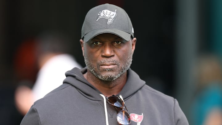 Tampa Bay Buccaneers head coach Todd Bowles walks around the field during warmups prior to a game against the Miami Dolphins
