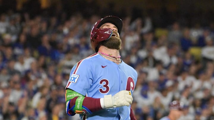 Oct 8, 2025; Los Angeles, California, USA; Philadelphia Phillies first baseman Bryce Harper (3) reacts after lining out during the seventh inning against the Los Angeles Dodgers during game three of the NLDS round for the 2025 MLB playoffs at Dodger Stadium. Mandatory Credit: Jayne Kamin-Oncea-Imagn Images