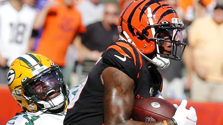 Cincinnati Bengals wide receiver Tee Higgins catches a two-point conversion against the Green Bay Packers in 2021. Cincinnati Bengals wide receiver Tee Higgins catches a two-point conversion against the Green Bay Packers in 2021.