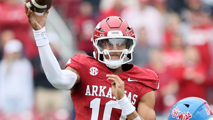 Nov 2, 2024; Fayetteville, Arkansas, USA; Arkansas Razorbacks quarterback Taylen Green (10) passes in the first quarter against the Ole Miss Rebels at Donald W. Reynolds Razorback Stadium. Mandatory Credit: Nelson Chenault-Imagn Images