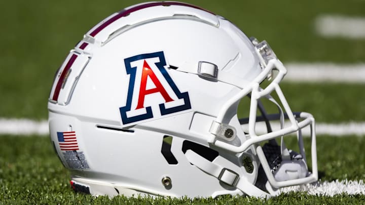Nov 25, 2022; Tucson, Arizona, USA; Detailed view of an Arizona Wildcats helmet on the field during the Territorial Cup at Arizona Stadium. Mandatory Credit: Mark J. Rebilas-Imagn Images