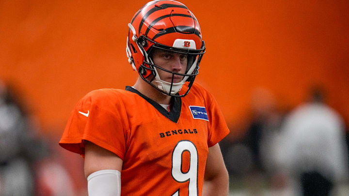 Cincinnati Bengals quarterback Joe Burrow (9) warms up before a preseason training camp practice in downtown Cincinnati on Thursday, July 31, 2025. Cincinnati Bengals quarterback Joe Burrow (9) warms up before a preseason training camp practice in downtown Cincinnati on Thursday, July 31, 2025.