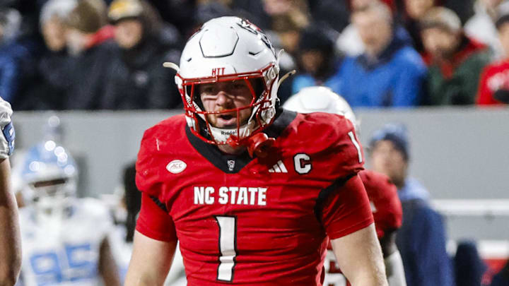 Nov 29, 2025; Raleigh, North Carolina, USA; NC State Wolfpack linebacker Caden Fordham (1) celebrates a down during the first half of the game against the North Carolina Tar Heels at Carter-Finley Stadium. Mandatory Credit: Jaylynn Nash-Imagn Images Nov 29, 2025; Raleigh, North Carolina, USA; NC State Wolfpack linebacker Caden Fordham (1) celebrates a down during the first half of the game against the North Carolina Tar Heels at Carter-Finley Stadium. Mandatory Credit: Jaylynn Nash-Imagn Images