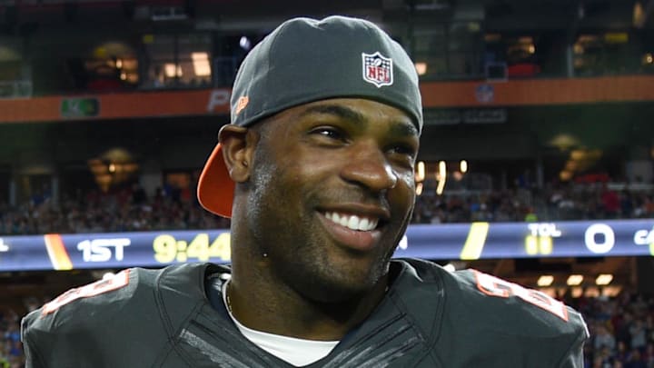 Jan 25, 2015; Phoenix, AZ, USA; Team Irvin head coach Jason Garrett of the Dallas Cowboys (left) talks with running back DeMarco Murray of the Dallas Cowboys (29) in the 2015 Pro Bowl against Team Carter at University of Phoenix Stadium. Mandatory Credit: Kyle Terada-Imagn Images