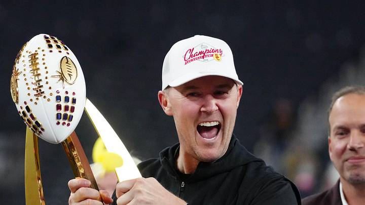 Dec 27, 2024; Las Vegas, NV, USA; Southern California Trojans head coach Lincoln Riley holds the championship trophy after the game against the Texas A&M Aggies at Allegiant Stadium. Mandatory Credit: Kirby Lee-Imagn Images Dec 27, 2024; Las Vegas, NV, USA; Southern California Trojans head coach Lincoln Riley holds the championship trophy after the game against the Texas A&M Aggies at Allegiant Stadium. Mandatory Credit: Kirby Lee-Imagn Images