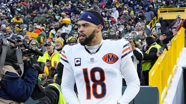 Dec 7, 2025; Green Bay, Wisconsin, USA;  Chicago Bears quarterback Caleb Williams (18) jogs onto the field prior to the game against the Green Bay Packers at Lambeau Field. Mandatory Credit: Jeff Hanisch-Imagn Images