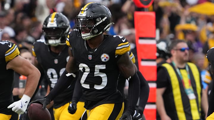 Sep 28, 2025; Dublin, Ireland; Pittsburgh Steelers safety Deshon Elliott (25) reacts after an interception on a pass thrown by Minnesota Vikings quarterback Carson Wentz (11) during the second quarter during an NFL International Series game at Croke Park. Mandatory Credit: Kirby Lee-Imagn Images