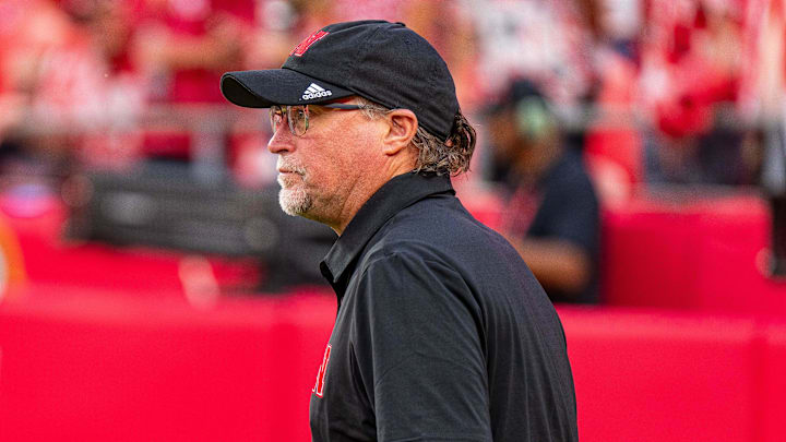 Nebraska Cornhuskers offensive coordinator Dana Holgorsen walks onto the field before the game against the Cincinnati Bearcats at GEHA Field at Arrowhead Stadium.