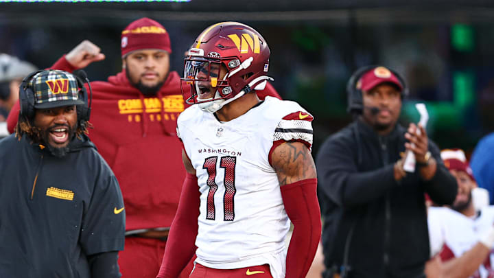 Nov 3, 2024; East Rutherford, New Jersey, USA; Washington Commanders safety Jeremy Chinn (11) reacts after a defensive stop during the second half against the New York Giants at MetLife Stadium. Mandatory Credit: Vincent Carchietta-Imagn Images