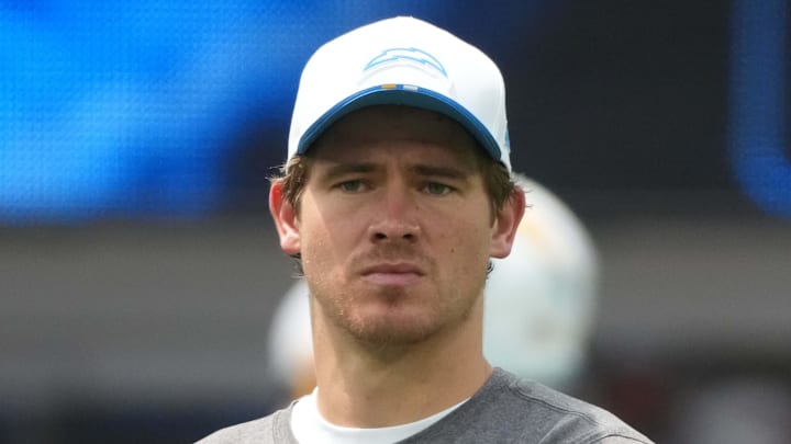 Aug 10, 2025; Inglewood, California, USA; Los Angeles Chargers quarterback Justin Herbert watches during the game against the New Orleans Saints at SoFi Stadium. Mandatory Credit: Kirby Lee-Imagn Images