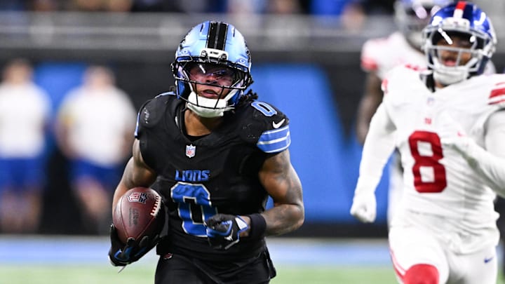 Detroit Lions running back Jahmyr Gibbs (0) runs the ball for a touchdown in over time against the New York Giants 