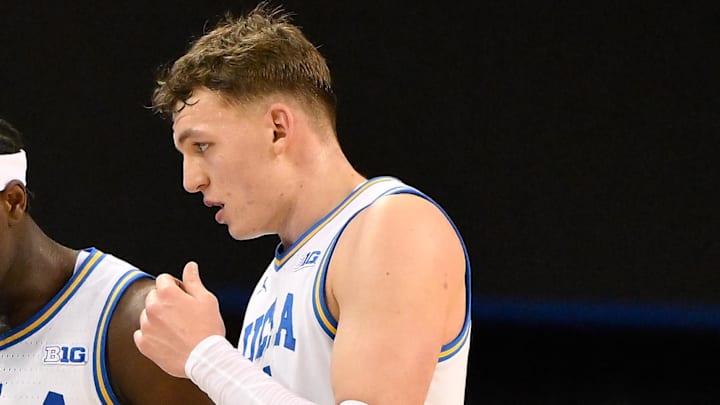 Feb 21, 2026; Los Angeles, California, USA; UCLA Bruins head coach Mick Cronin with guard Eric Dailey Jr. (3) and UCLA forward Tyler Bilodeau (34) during the second half at Pauley Pavilion presented by Wescom Financial. Mandatory Credit: Robert Hanashiro-Imagn Images