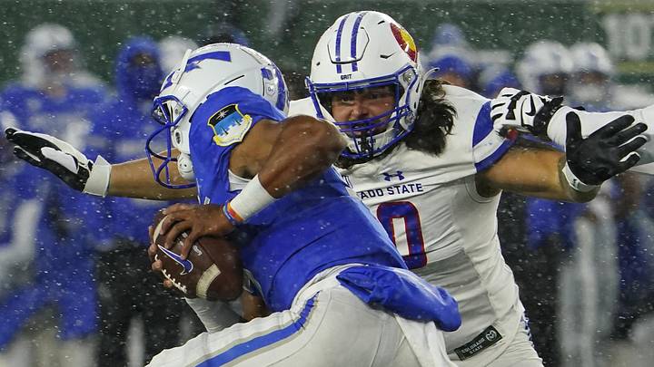 Oct 28, 2023; Fort Collins, Colorado, USA; Colorado State Rams defensive lineman Grady Kelly (90) chases Air Force Falcons quarterback Zac Larrier (9) in the second quarter at Sonny Lubick Field at Canvas Stadium. Mandatory Credit: Michael Madrid-Imagn Images Oct 28, 2023; Fort Collins, Colorado, USA; Colorado State Rams defensive lineman Grady Kelly (90) chases Air Force Falcons quarterback Zac Larrier (9) in the second quarter at Sonny Lubick Field at Canvas Stadium. Mandatory Credit: Michael Madrid-Imagn Images