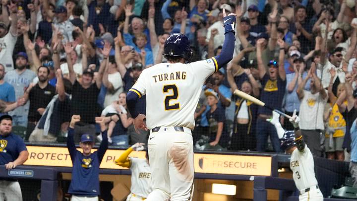 Sep 8, 2026; Milwaukee, Wisconsin, USA; Milwaukee Brewers second baseman Brice Turang (2) celebrates a walk offf hit by right fielder Luis Lara (18) (not pictured) in the tenth inning against the Chicago Cubs at American Family Field. Mandatory Credit: Michael McLoone-Imagn Images Sep 8, 2026; Milwaukee, Wisconsin, USA; Milwaukee Brewers second baseman Brice Turang (2) celebrates a walk offf hit by right fielder Luis Lara (18) (not pictured) in the tenth inning against the Chicago Cubs at American Family Field. Mandatory Credit: Michael McLoone-Imagn Images
