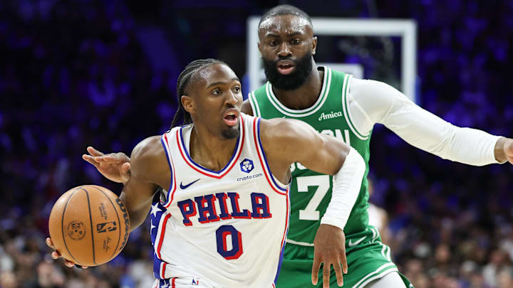 Apr 30, 2026; Philadelphia, Pennsylvania, USA; Philadelphia 76ers guard Tyrese Maxey (0) drives past Boston Celtics guard Jaylen Brown (7) during the third quarter at Xfinity Mobile Arena. Mandatory Credit: Bill Streicher-Imagn Images