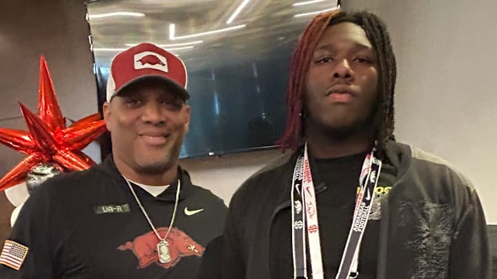 Arkansas Razorbacks defensive line coach Deke Adams poses with 2026 Union Parish defensive lineman Ari Slocum during his visit in Fayetteville, Arkansas Nov. 23, 2024.