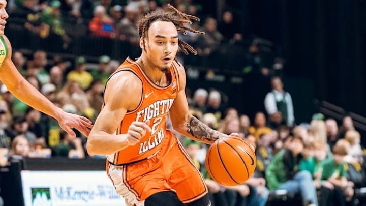 Illinois guard Dra Gibbs-Lawhorn (2) drives on an Oregon defender in the Illini's 109-77 win over the Ducks on Thursday in Eugene, Oregon.
