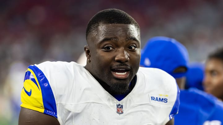 Dec 7, 2025; Glendale, Arizona, USA; Los Angeles Rams linebacker Byron Young (0) against the Arizona Cardinals at State Farm Stadium. Mandatory Credit: Mark J. Rebilas-Imagn Images