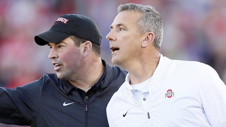 Ohio State Buckeyes head coach Urban Meyer and offensive coordinator Ryan Day yell from the sideline. Ohio State Buckeyes head coach Urban Meyer and offensive coordinator Ryan Day yell from the sideline.