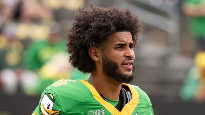 Oregon quarterback Dante Moore warms up as the Oregon Ducks host the Oklahoma State Cowboys on Sept. 6, 2025, at Autzen Stadium in Eugene, Oregon.