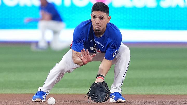 Toronto Blue Jays shortstop Andrés Giménez (0) fields balls during batting practice. Credit