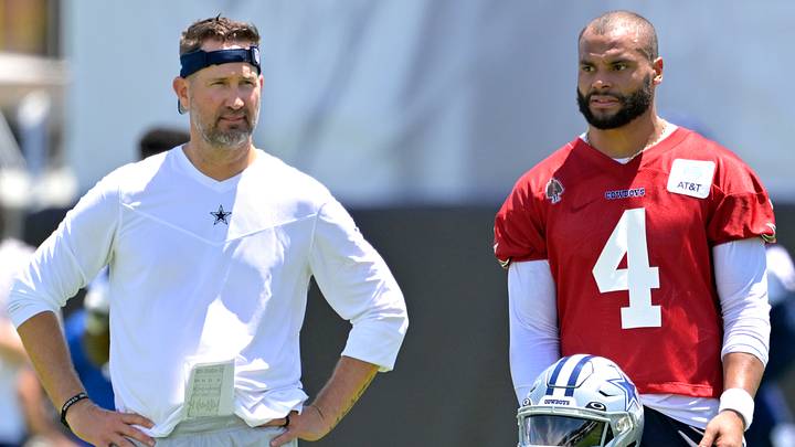 Dallas Cowboys QB Dak Prescott talks with Brian Schottenheimer during training camp at River Ridge Playing Fields.