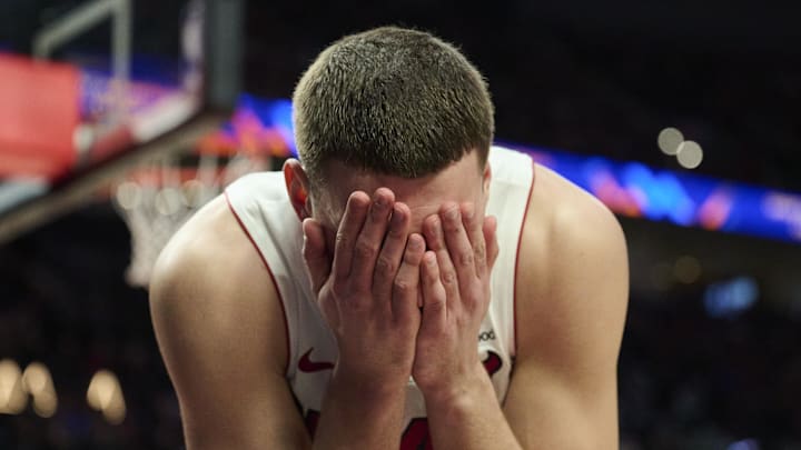 Miami Heat forward Nikola Jovic (5) covers his face (Mandatory Credit: Troy Wayrynen-Imagn Images)