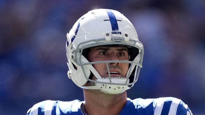 Indianapolis Colts quarterback Daniel Jones reacts after throwing a red zone interception