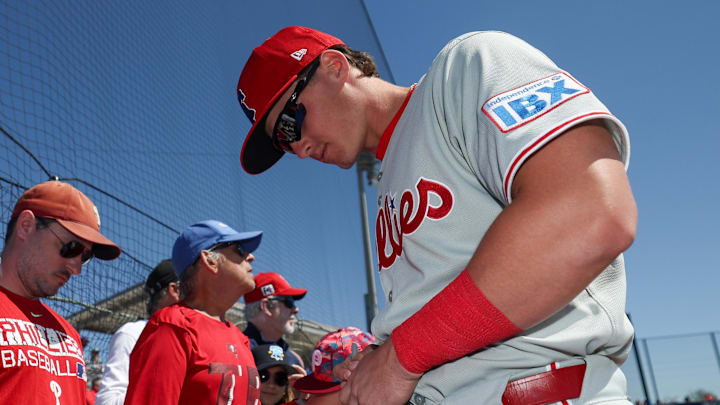 Mar 2, 2025; Dunedin, Florida, USA; Philadelphia Phillies infielder Aidan Miller (81) signs autographs for fans before a game against the Toronto Blue Jays during spring training at TD Ballpark. Mar 2, 2025; Dunedin, Florida, USA; Philadelphia Phillies infielder Aidan Miller (81) signs autographs for fans before a game against the Toronto Blue Jays during spring training at TD Ballpark.