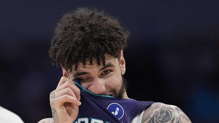 Apr 3, 2026; Charlotte, North Carolina, USA; Charlotte Hornets guard LaMelo Ball (1) and forward Brandon Miller (24) watch a free throw attempt during the second half against the Indiana Pacers at Spectrum Center. Mandatory Credit: Jim Dedmon-Imagn Images