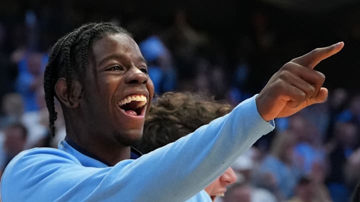 Feb 23, 2026; Chapel Hill, North Carolina, USA; North Carolina Tar Heels forward Caleb Wilson (8) and the bench react in the second half at Dean E. Smith Center. Mandatory Credit: Bob Donnan-Imagn Images