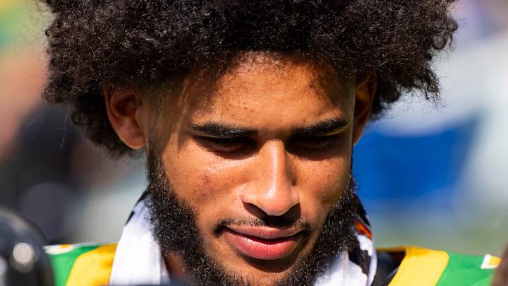 Aug. 30, 2025; Eugene, Oregon; Oregon quarterback Dante Moore speaks to a television reporter after playing host to the Montana State Bobcats at Autzen Stadium. Aug. 30, 2025; Eugene, Oregon; Oregon quarterback Dante Moore speaks to a television reporter after playing host to the Montana State Bobcats at Autzen Stadium.