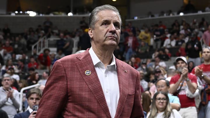 Arkansas Razorbacks coach John Calipari returns to the court after halftime against the Arizona Wildcats during a Sweet Sixteen game of the West Regional of the men's 2026 NCAA Tournament at SAP Center.