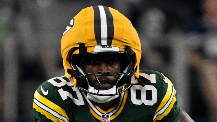 Sep 28, 2025; Arlington, Texas, USA; Green Bay Packers wide receiver Romeo Doubs (87) runs with the ball during the game between the Dallas Cowboys and the Green Bay Packers at AT&T Stadium. Mandatory Credit: Jerome Miron-Imagn Images