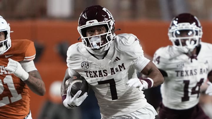 Texas A&M Aggies wide receiver KC Concepcion (7) returns a punt during the first half against the Texas Longhorns at Darrell K Royal-Texas Memorial Stadium.
