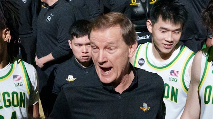 Oregon head coach Dana Altman, center, talks to his team before the game as the Oregon Ducks host the Washington Huskies on March 7, 2026, at Matthew Knight Arena in Eugene, Oregon.  