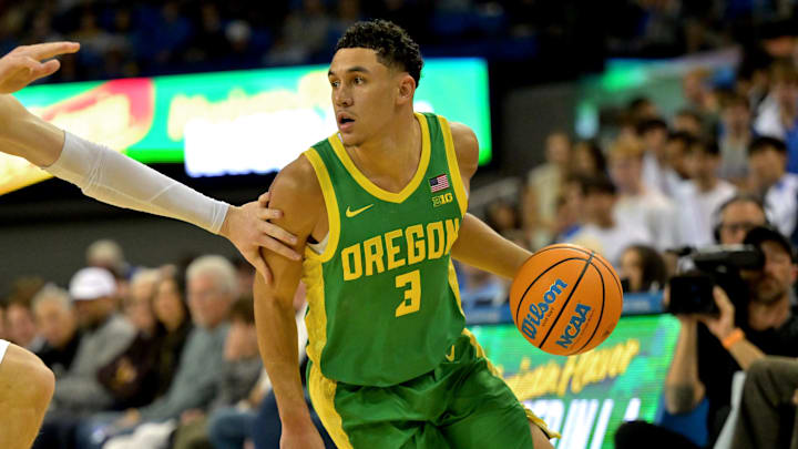 Dec 6, 2025; Los Angeles, California, USA;  UCLA Bruins forward Tyler Bilodeau (34) guards Oregon Ducks guard Jackson Shelstad (3) during the second half at Pauley Pavilion presented by Wescom Financial. Mandatory Credit: Jayne Kamin-Oncea-Imagn Images