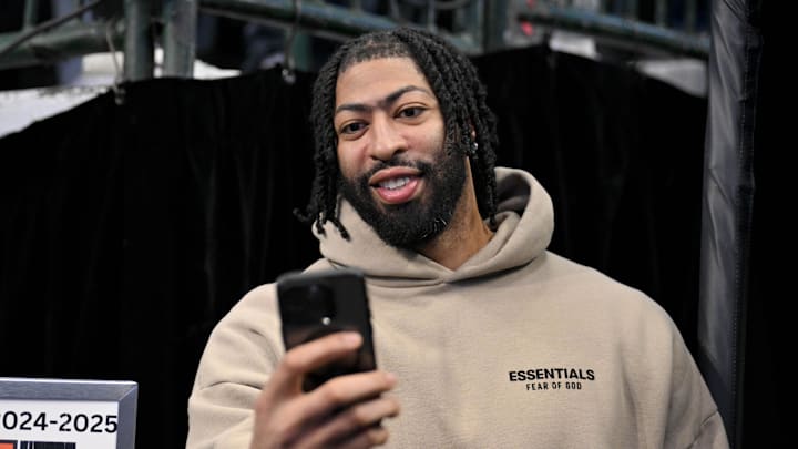 Mar 21, 2025; Dallas, Texas, USA; Dallas Mavericks forward Anthony Davis (3) takes a selfie for a fan before the game between the Dallas Mavericks and the Detroit Pistons at the American Airlines Center. Mandatory Credit: Jerome Miron-Imagn Images