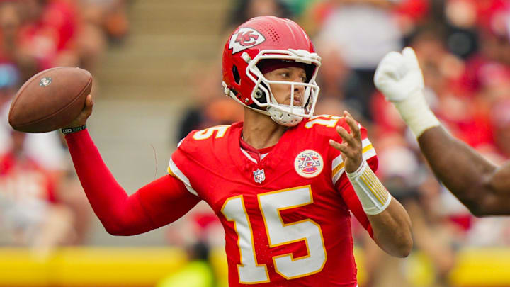 Sep 14, 2025; Kansas City, Missouri, USA; Kansas City Chiefs quarterback Patrick Mahomes (15) throws a pass during the first half against the Philadelphia Eagles at GEHA Field at Arrowhead Stadium.  
