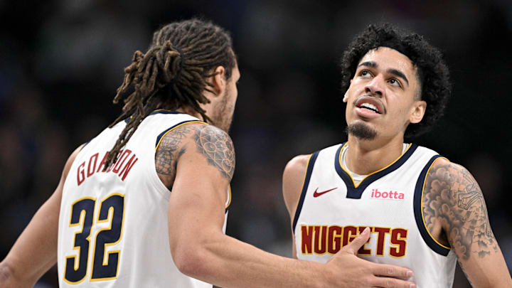 Jan 12, 2025; Dallas, Texas, USA; Denver Nuggets forward Aaron Gordon (32) and guard Julian Strawther (3) celebrate during the second quarter against the Dallas Mavericks at the American Airlines Center. Jan 12, 2025; Dallas, Texas, USA; Denver Nuggets forward Aaron Gordon (32) and guard Julian Strawther (3) celebrate during the second quarter against the Dallas Mavericks at the American Airlines Center.