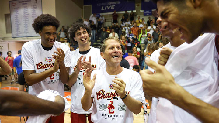 Nov 26, 2025; Lahaina, HI, USA;  USC Trojans head coach Eric Musselman reacts with his team after they defeated the Arizona State Sun Devils in the championship match at Lahaina Civic Center. Mandatory Credit: Marco Garcia-Imagn Images