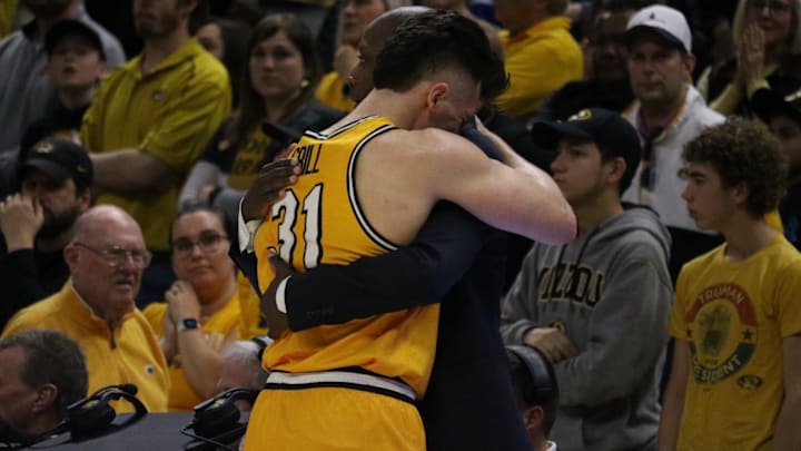 Mar 8, 2025; Columbia, Missouri USA; Missouri Tigers guard Caleb Grill (31) cries in the arms of head coach Dennis Gates during his final game at Mizzou Arena — a loss to the Kentucky Wildcats. Mar 8, 2025; Columbia, Missouri USA; Missouri Tigers guard Caleb Grill (31) cries in the arms of head coach Dennis Gates during his final game at Mizzou Arena — a loss to the Kentucky Wildcats.